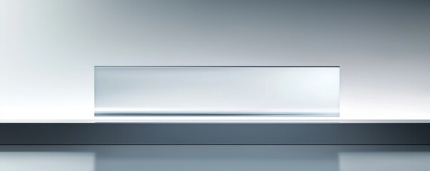 Minimalistic design showcasing a clear glass panel on a sleek surface.