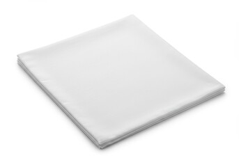 A stack of square white paper sheets placed diagonally on a white surface in a simple studio shot