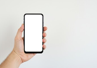 A hand holding a black smartphone with a blank white screen against a white background in portrait mode