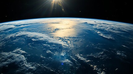 Fototapeta premium Stunning earth sunrise view from space amazing planet blue ocean cloudscape sky dark world scene