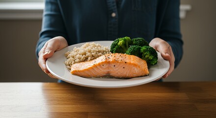 Serving Plate with Salmon Broccoli and Grains for Balanced Meal