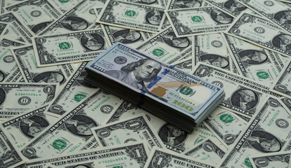 Background of US dollars. Money and coins on table. Cash money concept. Dollar bills background. American currency. Banknotes and Dollars bills. Money exchange idea. Crisis for US dollars.