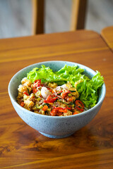 Sambal matah rice bowl, captured on April 30, 2025. Steamed rice served with flavorful chicken and Balinese raw chili relish, delivering a spicy, fresh, and aromatic Indonesian taste