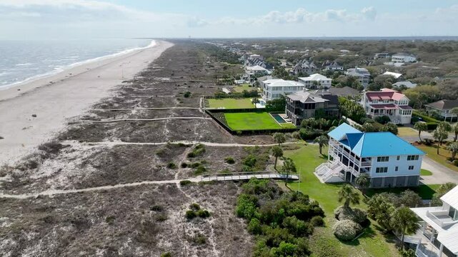 aerial slow push over beachfront homes at isle of palms sc, south carolina