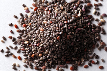 Chia Seeds: A close-up shot of chia seeds, displaying their natural texture, rich color and form, capturing the raw essence of this superfood.