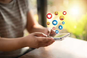 Social Distancing ,Working From Home concept..The concept of living on vacation and playing social media. Social media and digital online concept, man using smart phone with Social media..