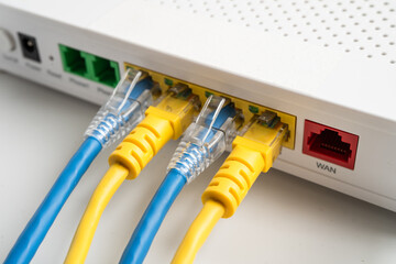 Ethernet cable with wireless router connect to internet service provider internet network.