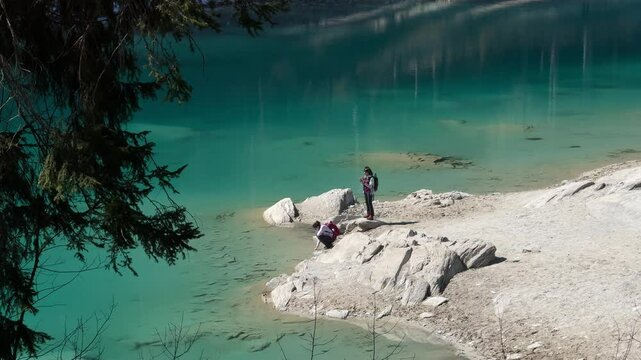 Mountain trek tourists Lake Cauma Switzerland Caumasee beautiful nature