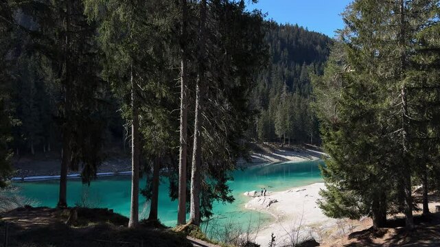 Lake Cauma turquoise color water Caumasee Switzerland nature Swiss Alps forest landscape view
