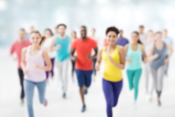 Fototapeta premium diverse group different races and ages engaging in physical activity background elegantly blurred
