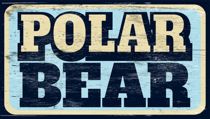 Fototapeta premium Aged and worn polar bear sign on wood