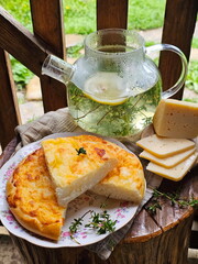 Khachapuri with thyme tea