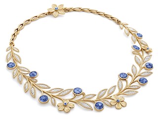 Elegant gold necklace on a plain white backdrop