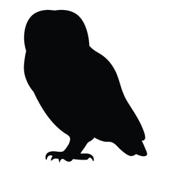 Silhouette of a majestic owl, a night bird, standing and watching