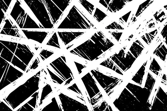 Abstract black and white textured pattern with intersecting, brush-stroke lines  Intricate network of lines