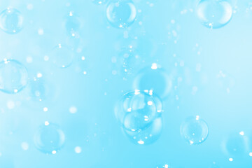 Beautiful Shiny Blue Soap Bubbles Floating in The Air. Freshness Soap Suds Bubbles Water. Celebration Festive Backdrop. Blue Bubbles Textured Background.	
