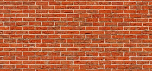 Fototapeta premium Solid Brick Wall: A striking image showcases a solid brick wall, a testament to enduring architecture and timeless design, a vivid representation of craftsmanship and strength.