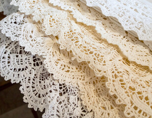 Naklejka premium Intricate lacework of traditional Chilean crafts, such as tablecloths or doilies, showcasing delicate handwork and European influences.