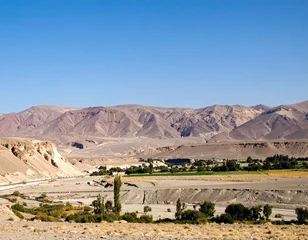 Fototapeten The arid and otherworldly landscapes of the Elqui Valley with its clear skies, known for stargazing and pisco production. © Vitali