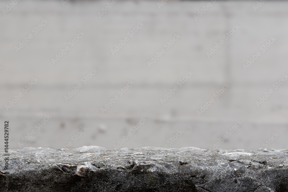 Poster Stone table. Concrete stone display empty copy space with blurred background. Stone table copy space. Stone concrete counter for product placement