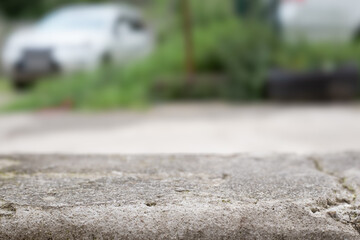 Stone table. Stone platform copy space with blurred background. Empty stone concrete grey table display template countertop for product placement and design. Luxury stone table podium
