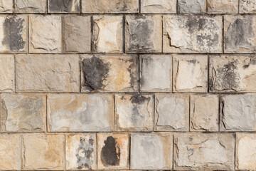 Sandstone and limestone tile bricks wall surface texture background. Wall background. Limestone tile texture