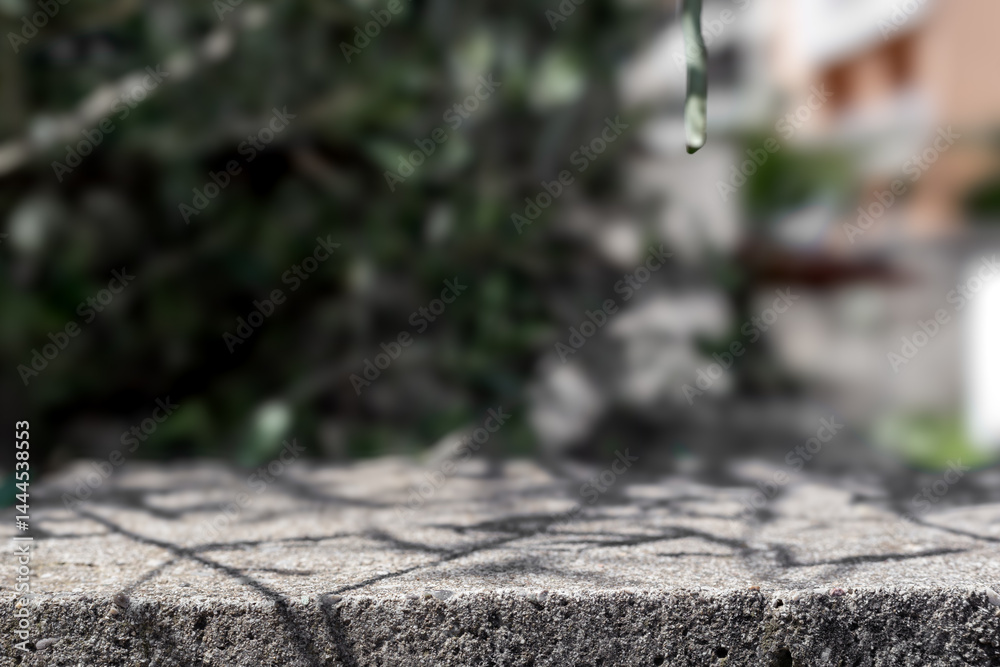 Aufkleber Stone concrete table with sunlight and leaves shadows sunny background. Summer stone table background with blurred bokeh. Minimalistic nature stone podium table summer cozy background copy space