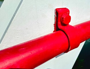 Fire extinguisher pipes are attached to the iron bridge supports