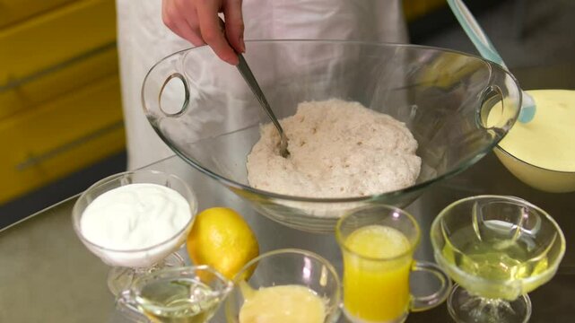 cheff Hands kneading dough on table preparing bread pastry yeast flour Cooking food concept background slow motion. High quality 4k footage