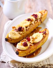 Caramelized banana boats with golden brown sugar glaze, served warm for a rich tropical dessert