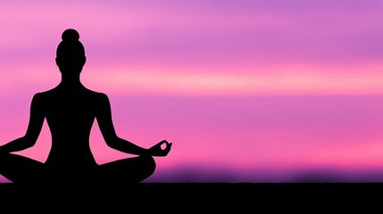 A silhouette figure meditating in the lotus position at sunrise