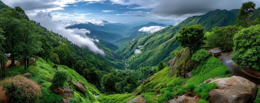 Stunning Mountain Valley Landscape with Clouds and Lush Greenery in Vagamon, India. Travel Destination Scenery.