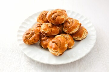Cashew nut cookies,Singapore Cookies in a white plate on white background