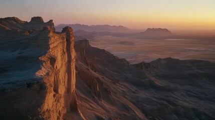 Fototapeta premium Ethereal cliffs and desert ridges bask in the sunsets glow