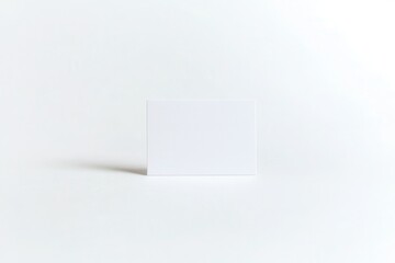 Blank white card on a clean surface, ideal for branding or promotional use