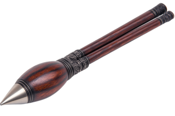 Antique projectile weapon.  Wooden projectile head with metal accents