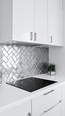 A modern kitchen featuring sleek white cabinets, gleaming silver tiles reflecting light, and a stylish countertop, creating a bright and inviting atmosphere.