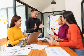 Fototapeta premium Group of business people are having a presentation meeting in an office room.