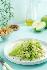 A plate with Waldorf salad, traditional American