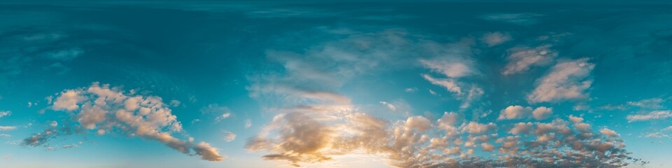 Obraz premium 360 panorama of glowing sunset sky with bright Cirrus clouds. Seamless hdr spherical 360 panorama. Sky dome in 3D visualization, sky replacement for aerial drone panoramas. Weather and climate change