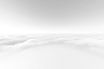 A vast expanse of clouds, light and airy, stretches horizontally across the image  A soft, pale light illuminates the scene