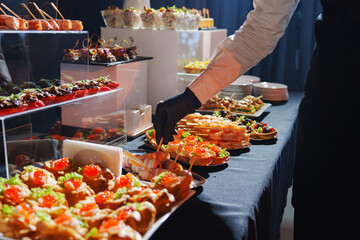 Elegant catering setup showcases gourmet bites at an upscale event