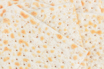 Matzah for passover Jewish pesach background. top view
