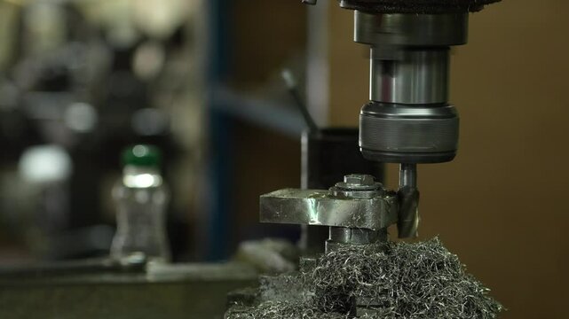 VDO 4K Lathe is working on turning metal parts for industrial use.