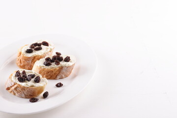 sourdough with raising topping isolated on white background