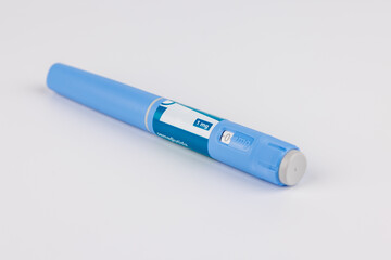 Obesity and type 2 diabetes injectable treatment pens on white table