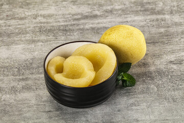 Canned yellow pear with syrup