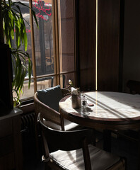 Minimalist café table with daylight