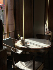Minimalist café table with daylight