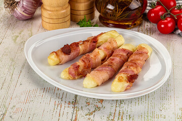 Hot mozzarella sticks with bacon